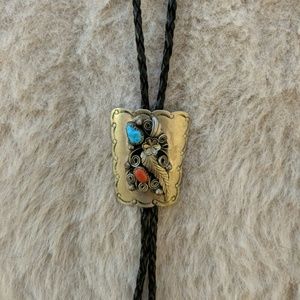 Bolo tie with turquoise on leather cord